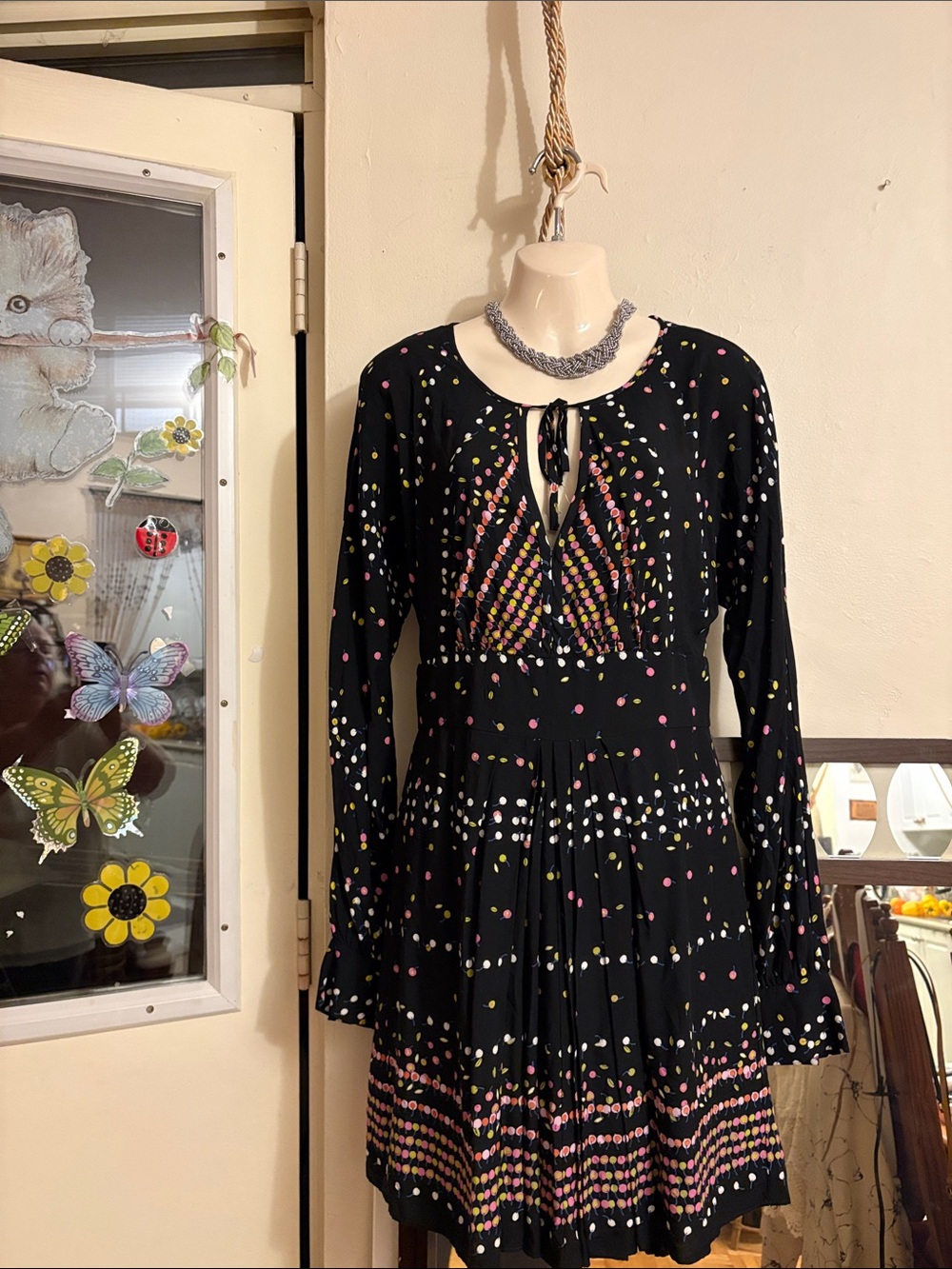 Free People Black Long-Sleeve Polka Dot Tie-Neck Mini Dress. Rayon